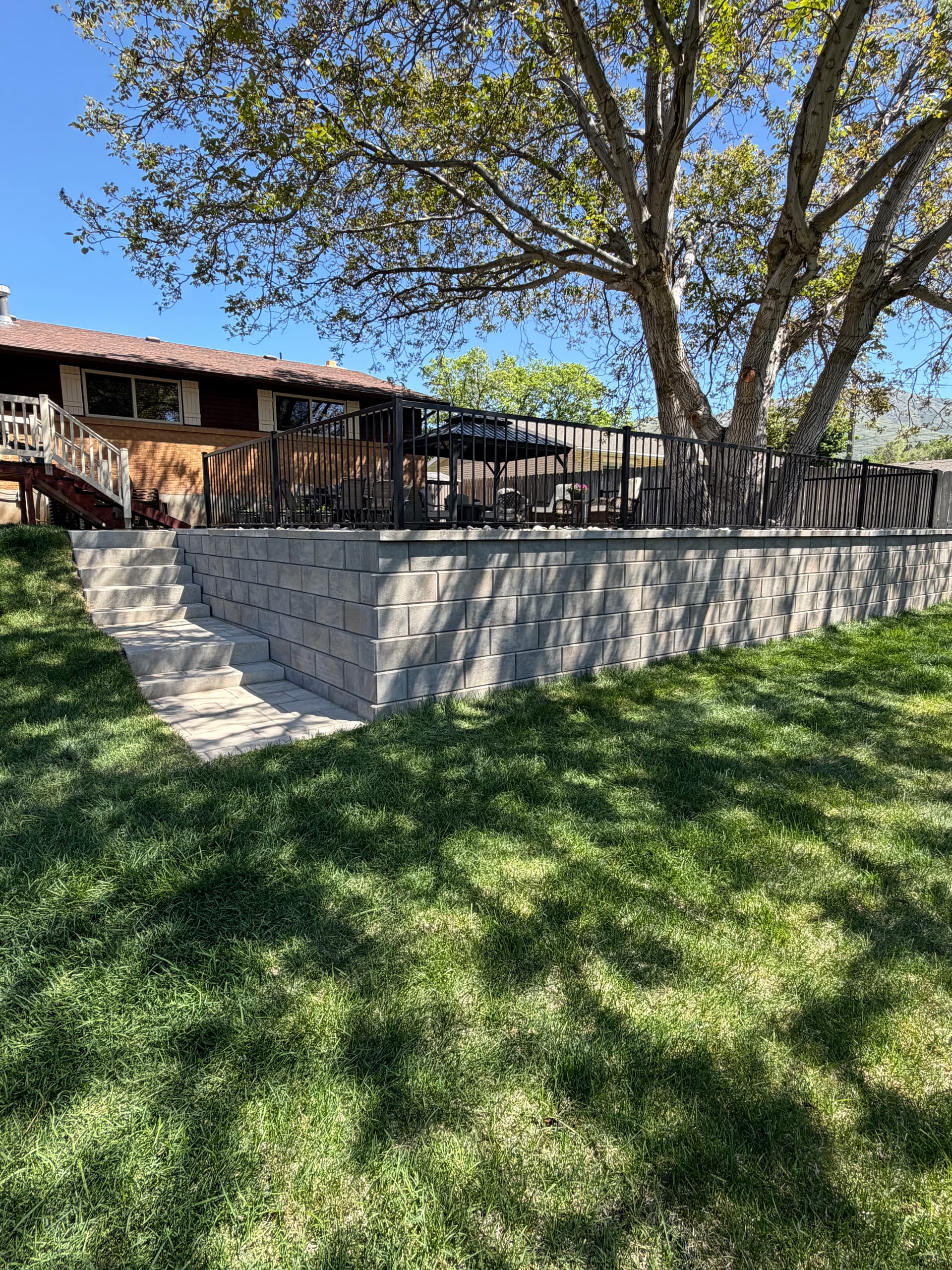 Sloped Backyard Turned Into a Real Outdoor Living Space image